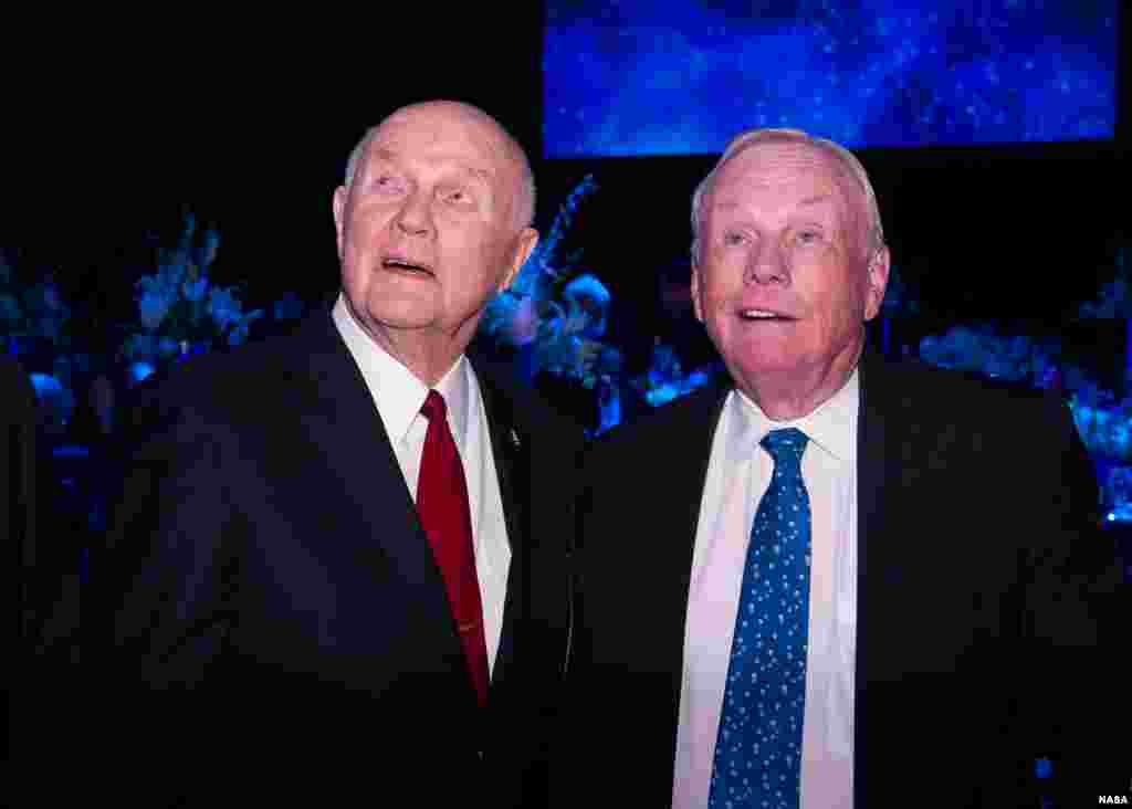 Sen. John Glenn, left, and Apollo 11 Astronaut Neil Armstrong are seen prior to the start of a dinner at Ohio State University that honored the 50th anniversary of John Glenn's historic flight aboard Friendship 7 in Columbus, Ohio, Feb. 20, 2012. 