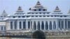 In this photo taken March 27, 2010, daily waged labors work at new parliament building in Nay Pyi Taw, Myanmar. Freedom of speech for members of parliament in military-controlled Myanmar will be restricted under laws that dictate the functioning of the ne