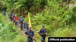 Myanmar police officers patrol along the border fence between Myanmar and Bangladesh in Maungdaw, Rakhine State, Myanmar (MOI)