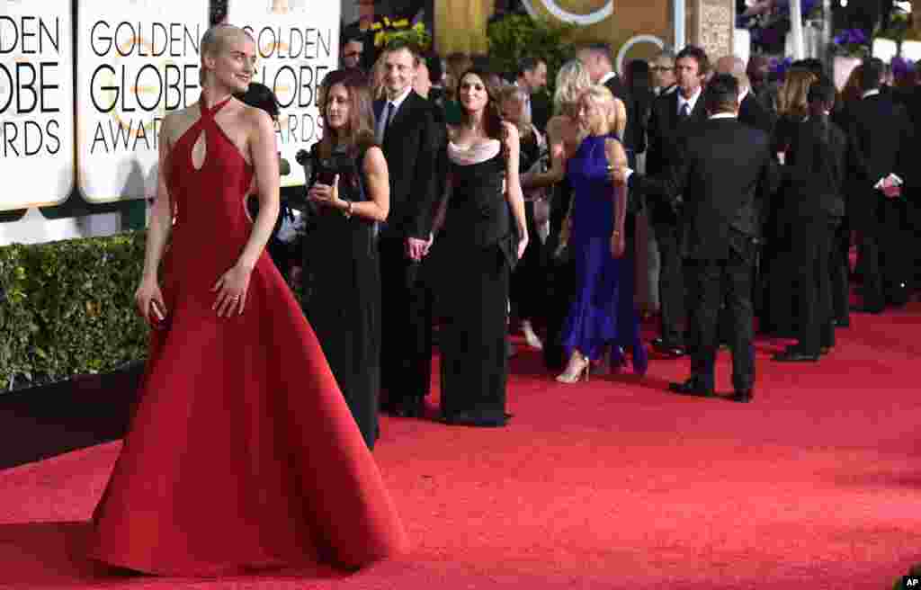 Actress Taylor Schilling arrives at the 72nd annual Golden Globe Awards at the Beverly Hilton Hotel Jan. 11, 2015, in Beverly Hills, California.