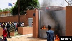 Pro-junta protesters gather outside the French Embassy in Niamey after military coup in Niger