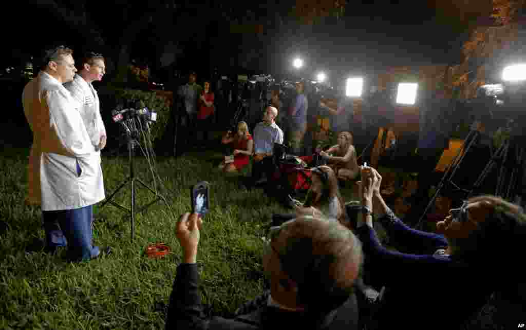 Dr. Igor Nichiporenko, Medical Director Trauma, left, and Dr. Evan Boyer, Medical Director, Emergency Services, speak about treating victims and the suspect at a press conference outside Broward Health North hospital, Feb. 14, 2018, in Deerfield Beach.