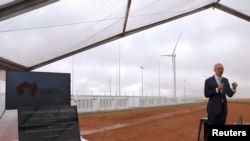 South Australian Premier Jay Weatherill speaks as he stands next to a plaque during the official launch of the Hornsdale Power Reserve, featuring the world's largest lithium ion battery made by Tesla, near the South Australian town of Jamestown, Dec. 1, 2