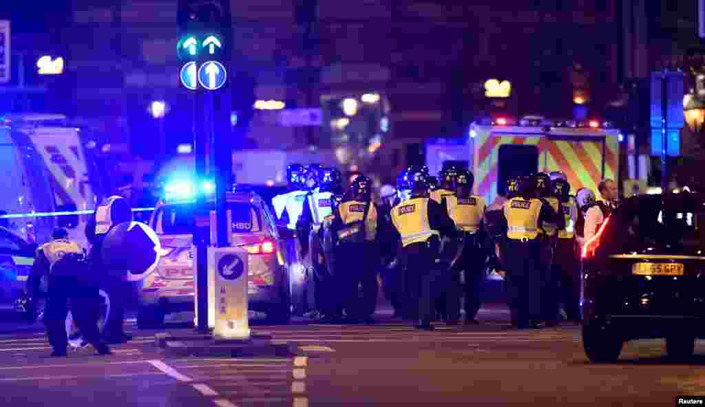 Police attend to an incident on London Bridge in London, Britain, June 3, 2017.