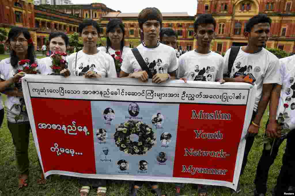 RTX1KVMV 19 Jul. 2015 Yangon, Myanmar Members of Muslims Youth Network Myanmar pose for photos during an event marking the anniversary of Martyrs' Day at the Ministers' Building, formerly known as the Secretariat Builidng, where General Aung San and eight