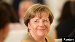 Bà Angela Merkel.