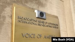 Signage is seen at the entrance to Voice of America headquarters in Washington. (Mia Bush/VOA)