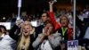 Delegates listen to speakers on the first night of the DNC (Photo: A. Shaker/VOA)