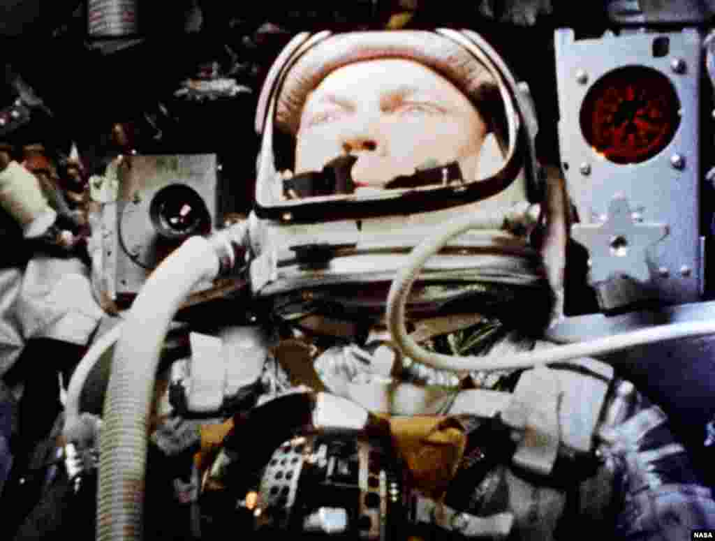 A camera onboard the "Friendship 7" Mercury spacecraft photographs astronaut John H. Glenn Jr. during his historic flight, Feb. 20, 1962.