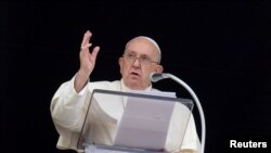 Pope Francis leads the Angelus prayer on the World Day of the Poor at the Vatican