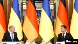 German Chancellor Olaf Scholz and Ukrainian President Volodymyr Zelenskiy attend a joint news conference in Kyiv, Ukraine February 14, 2022.