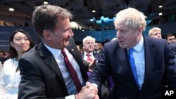 Jeremy Hunt (ဝဲ) နဲ့ Boris Johnson (ယာ) (ဇူလိုင်၊ ၂၃၊ ၂၀၁၉) 