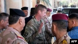 US Major General Joel "J.B." Vowell leaves after a meeting with Iraqi Prime Minister and top-ranking officials of the Iraqi armed forces and of the US-led coalition during the first round of talks on the future of American and other foreign troops in the 