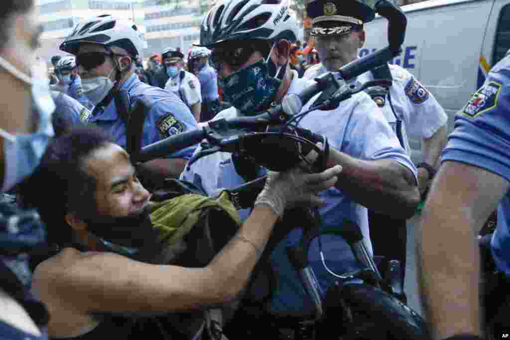 Philadelphia police confront protesters during the Justice for George Floyd Philadelphia Protest on Saturday, May 30, 2020. Floyd died in Minneapolis police custody on Memorial Day, after an officer pressed his knee into his neck for several minutes even 