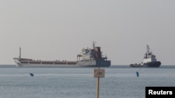 The cargo ship Polarnet leaves the sea port in Chornomorsk