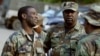 The high command of the rebel Haitian National Revolutionary Liberation Front, L-R, Commander in Chief Guy Philippe, Commander Ramicien Ravix and Commander Louis Jodel Chamblain