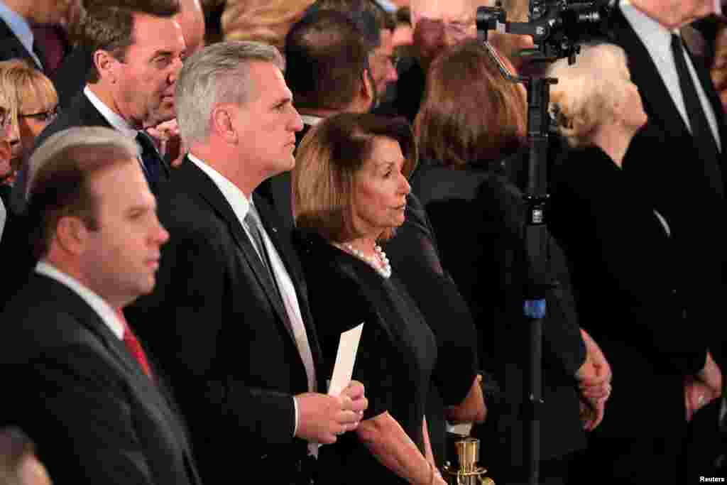 U.S. House Minority leader Kevin McCarthy (R-CA) and Representative Nancy Pelosi (D-CA) attend ceremonies for the late former U.S. President George H.W. Bush inside the U.S. Capitol rotunda in Washington, D.C., Dec. 3, 2018. 