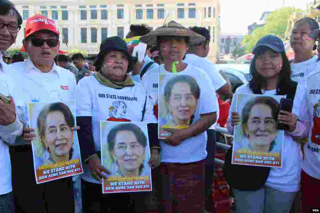 Myanmar people hold rallies to show support for Aung San Suu Kyi, who will appear before the International Court of Justice to contest a case filed by Gambia accusing Myanmar of genocide against its Rohingya Muslim minority. 