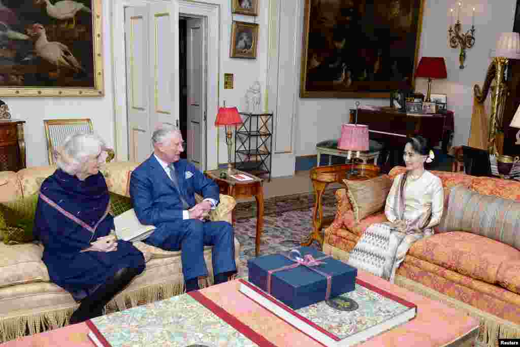 Britain's Prince Charles and Camilla, the Duchess of Cornwall meet Burma's de facto leader Aung San Suu Kyi